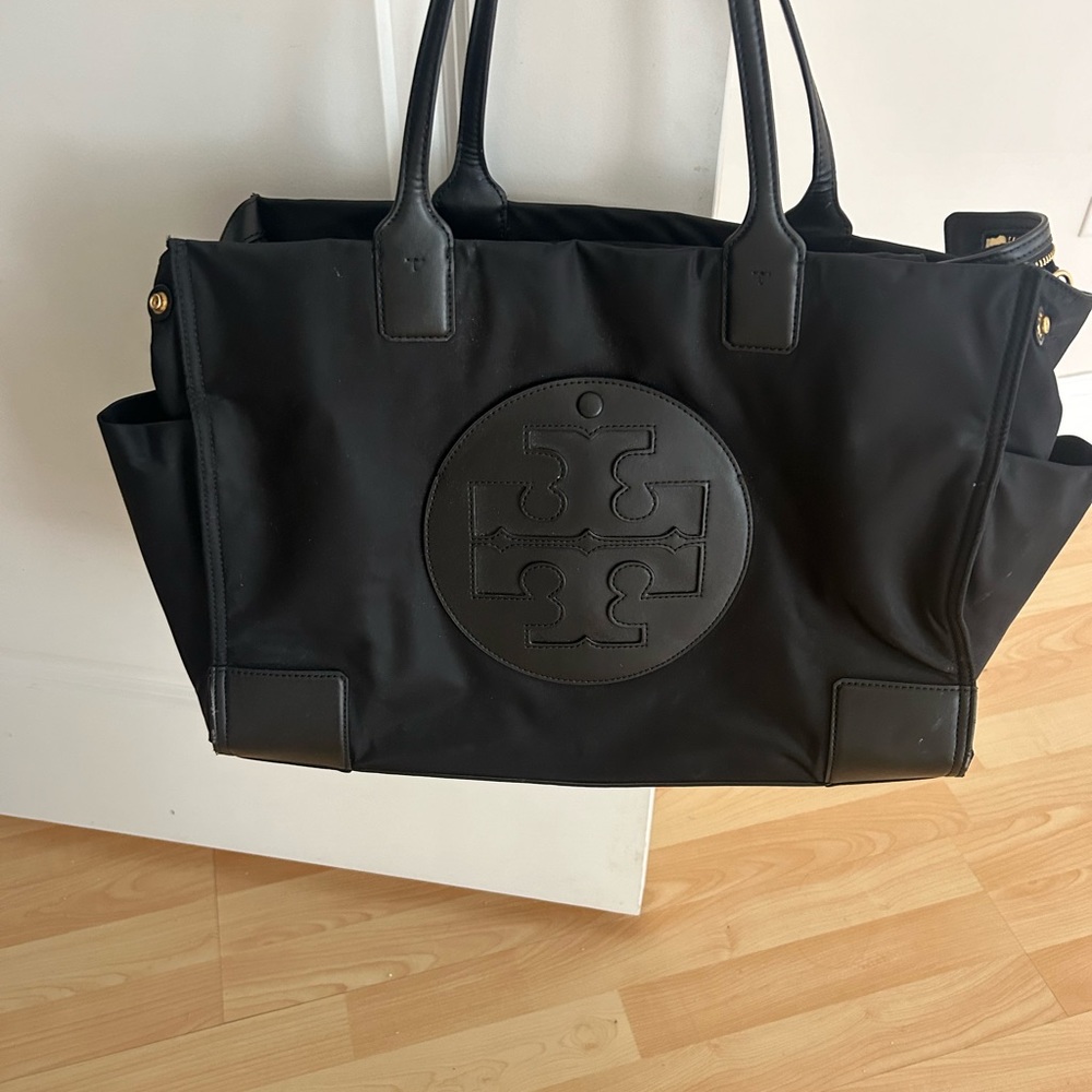 Black diaper  Bag with Textured Fabric and Embossed emblem . Lots of room